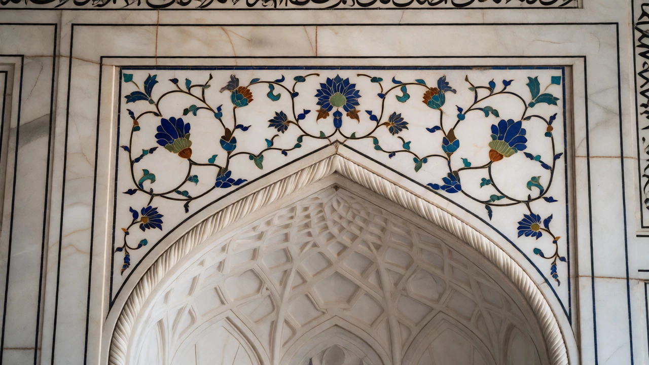 Close-up of intricate floral pietra dura inlay and black calligraphy on white marble